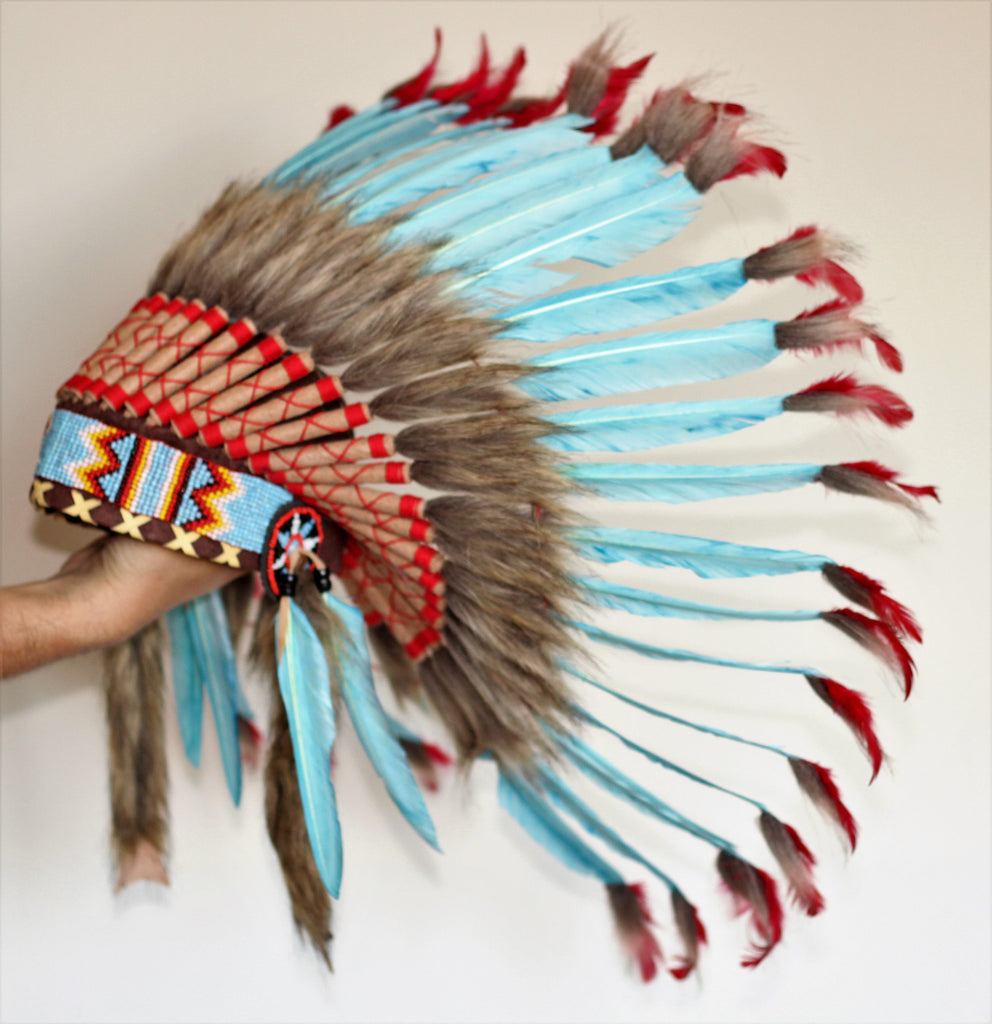 X55 -  Turquoise Chief indian Feather Headdress .